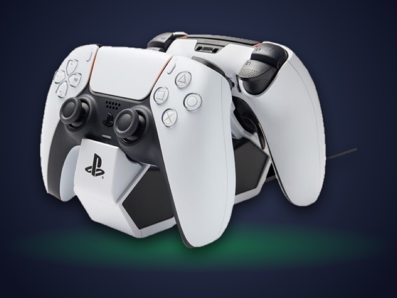 PowerA Twin Charging Station with two white DualSense controllers docked